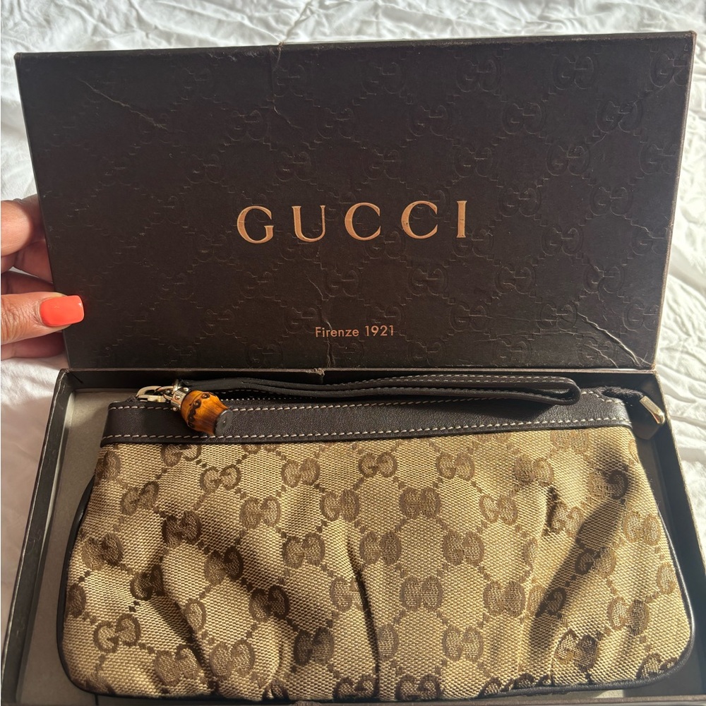Gucci wristlet 100% authentic